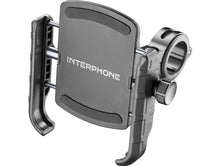 Load image into Gallery viewer, Az&nbsp;Interphone SMCRAB24&nbsp;telefontartó&nbsp;12–32 mm átmérőjű kormányokra&nbsp;szerelhető, így széleskörű motoros modellekkel kompatibilis.
A&nbsp;gyors kioldó rendszer&nbsp;lehetővé teszi a telefon egyszerű behelyezését és eltávolítását, így nem kell időt pazarolni a telepítésre.

A&nbsp;beépített rezgéscsillapító betét&nbsp;csökkenti a motor által továbbított káros rezgéseket, minimalizálva az okostelefon sérülésének kockázatát. Ez különösen fontos hosszabb túrák vagy egyenetlen utakon történő közl